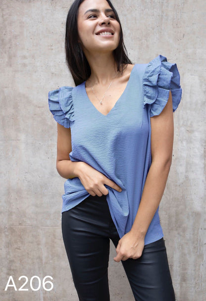 A206 - Polera Cuello V con Vuero