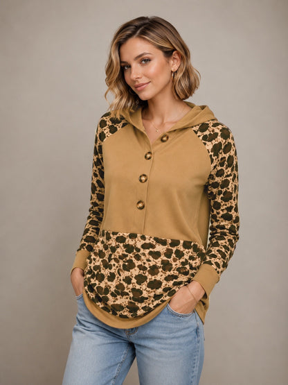 A427- Polera animal print con gorro