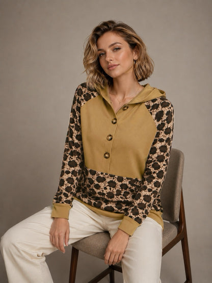 A427- Polera animal print con gorro