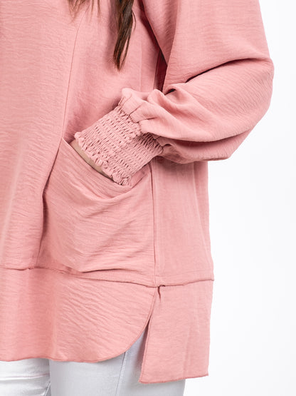 A283 - Polera Manga Larga Puño Elasticado Cuello Redondo y Bolsillos